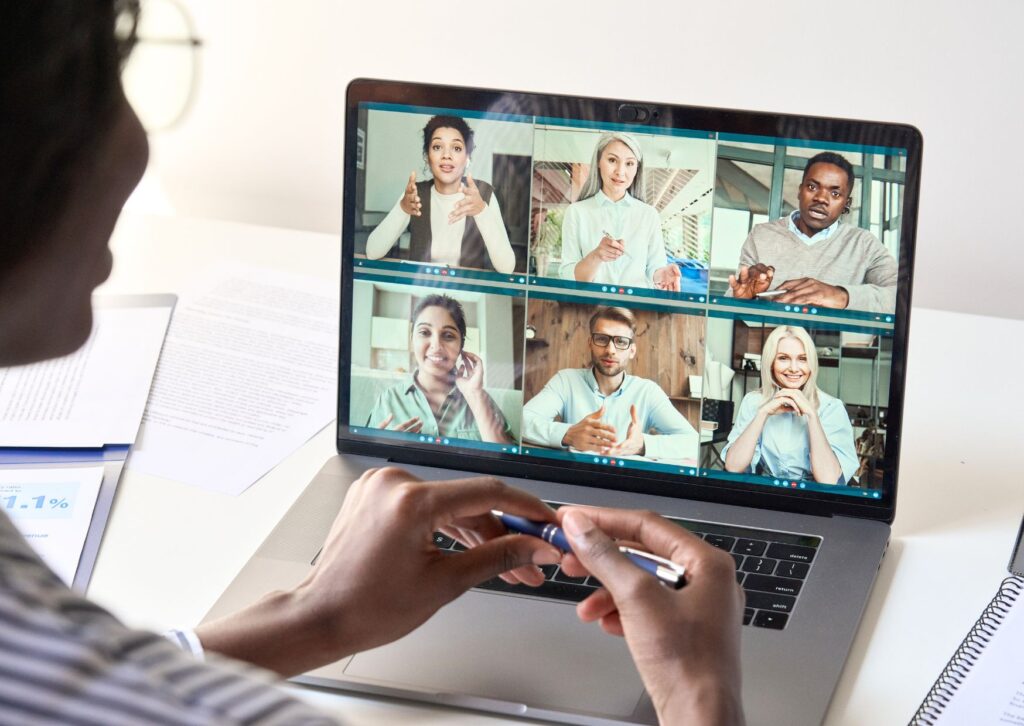 a-laptop-showing-staff-in-a-virtual-meeting