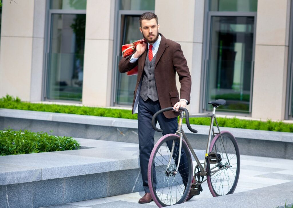 office man with bike looking like he's cycling to work