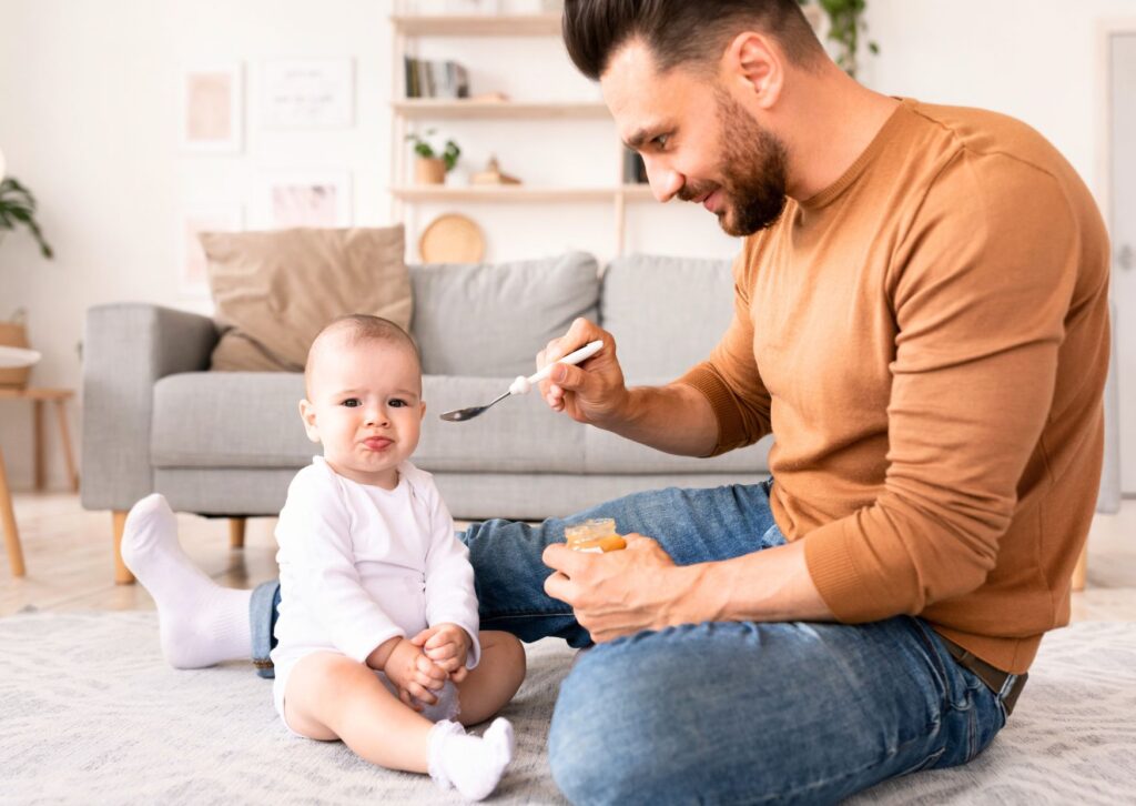 dad-on-parental-leave-feeding-baby