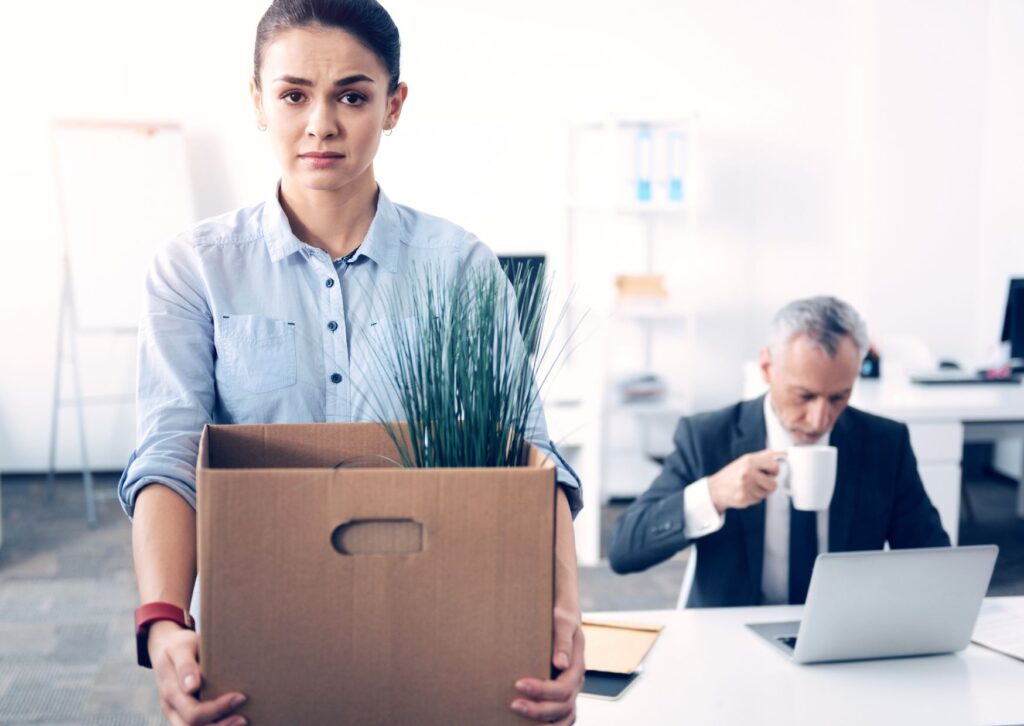 employee-leaving-her-job-holding-a-box