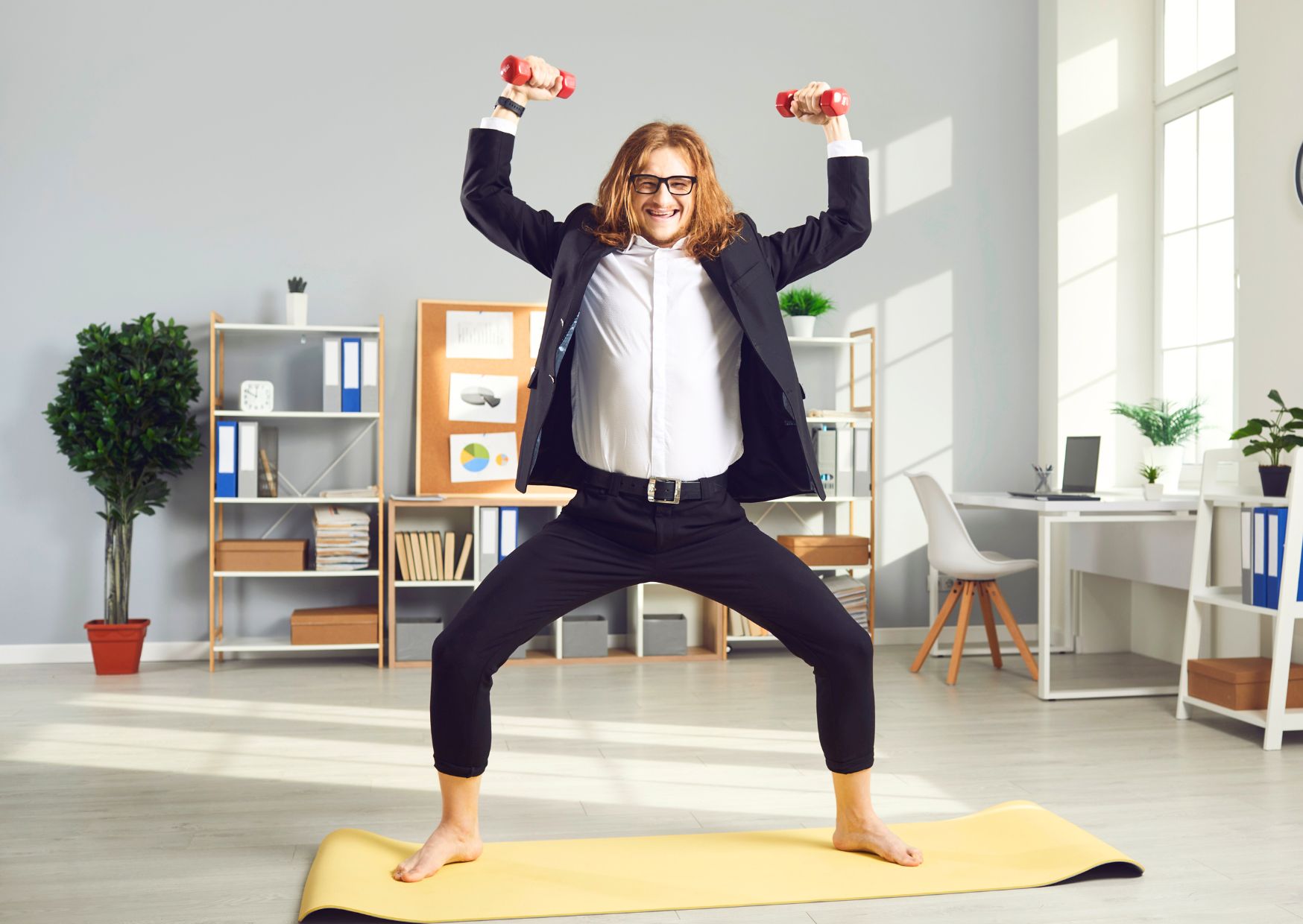 employee-looking-after-his-physical-health-by-exercising-at-home