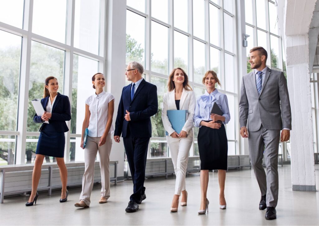 employees having a walking team meeting