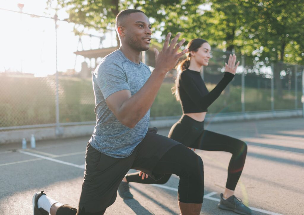 man-and-women-exercising-outside