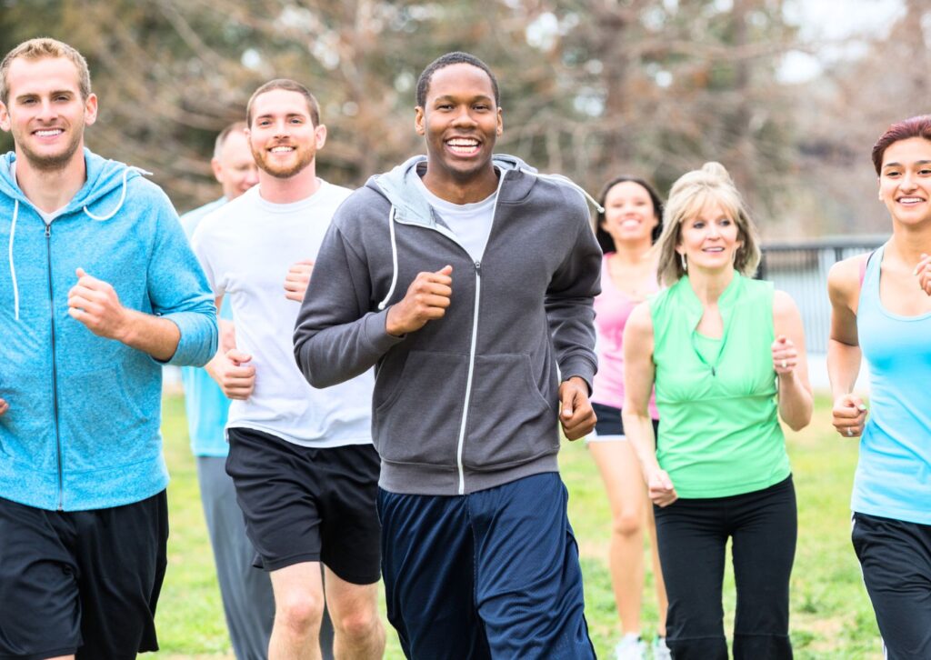 happy-people-running-together-having-fun