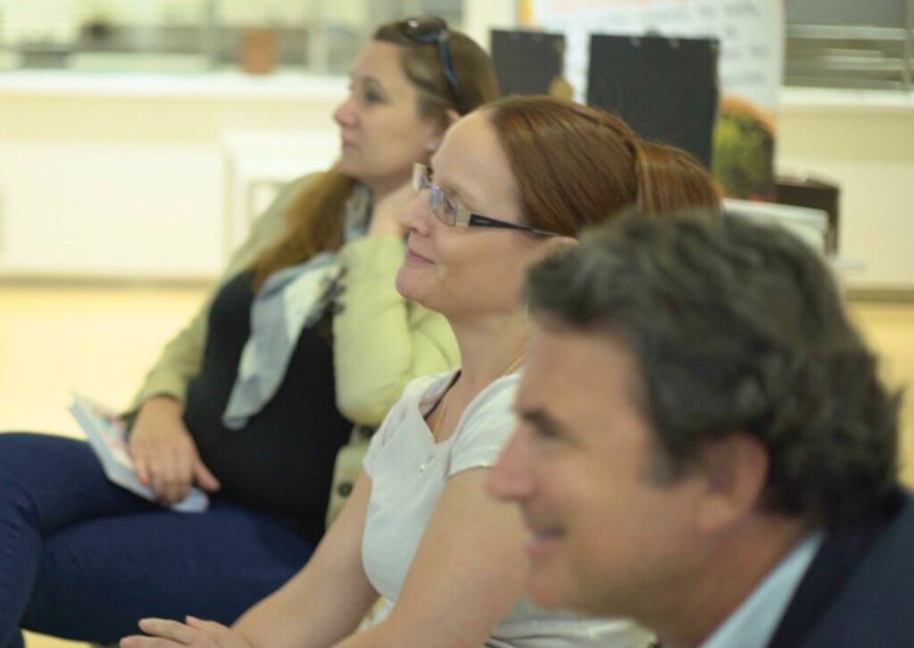 happy-staff-at-an-employee-wellbeing-workshop