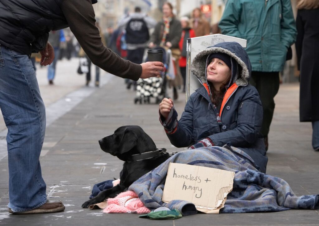 homeless-man-being-given-a-coffee