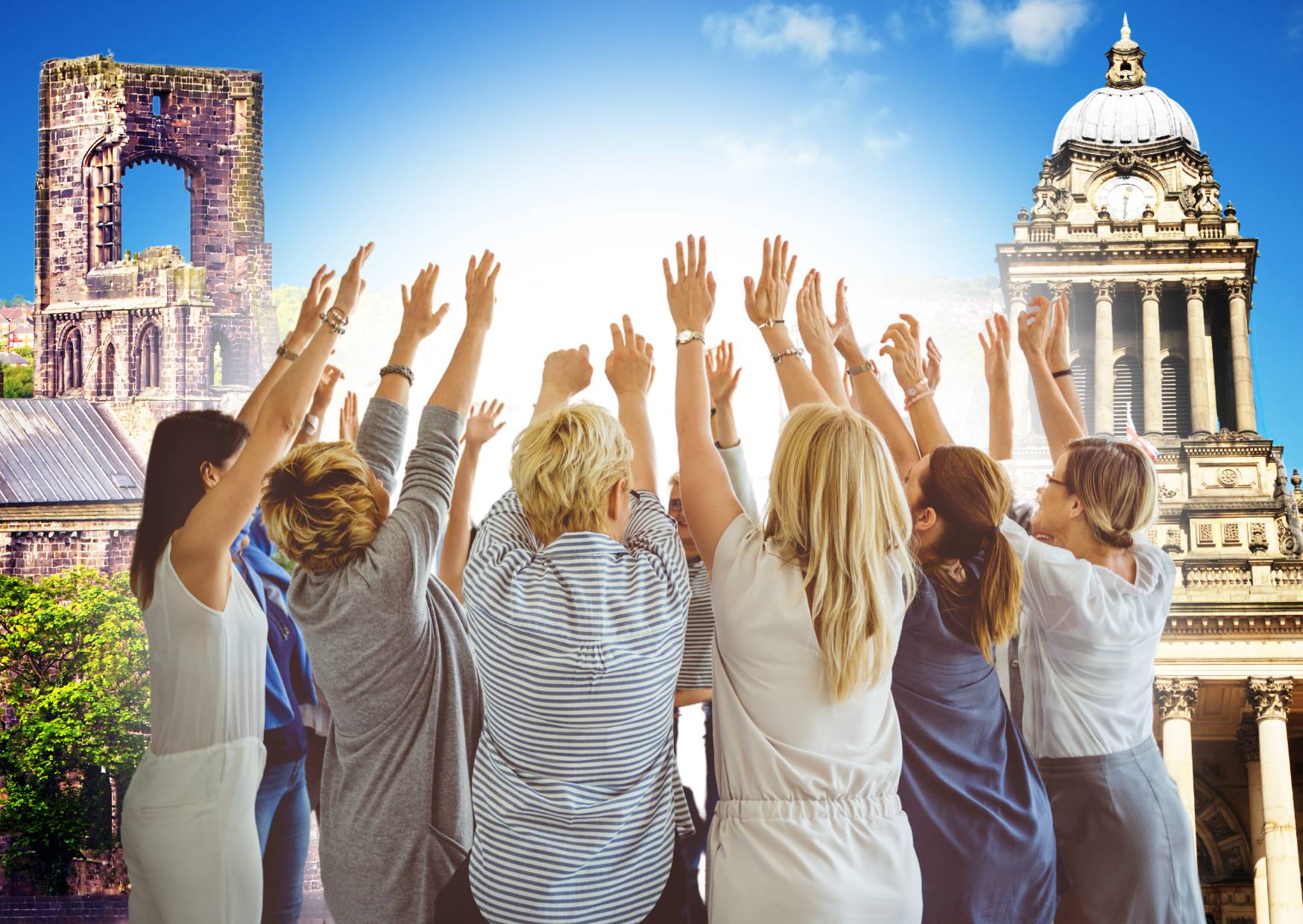 ladies-with-hands-in-the-air-team-building-with-iconic-leeds-attractions-in-the-background