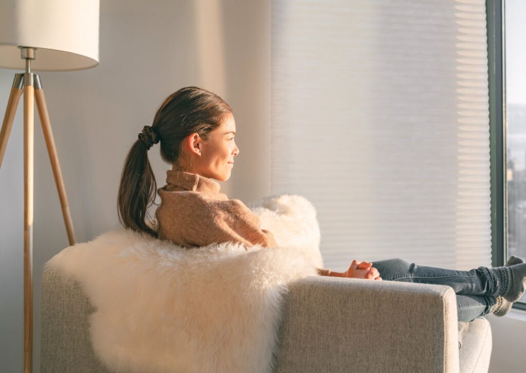 lady-relaxing-sitting-on-a-chair