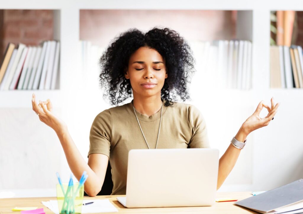 lady-taking-a-meditation-break-at-work