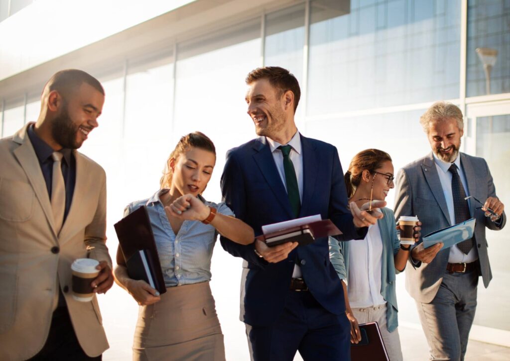 leaders-walking-outside-an-office-building