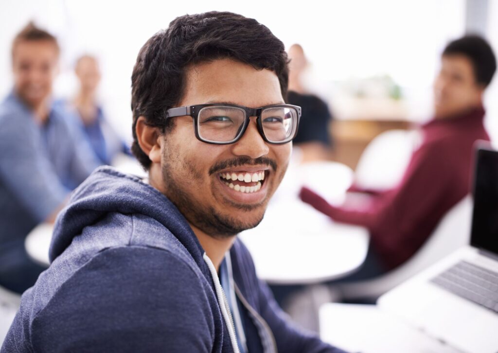 Man-smiling-at-work