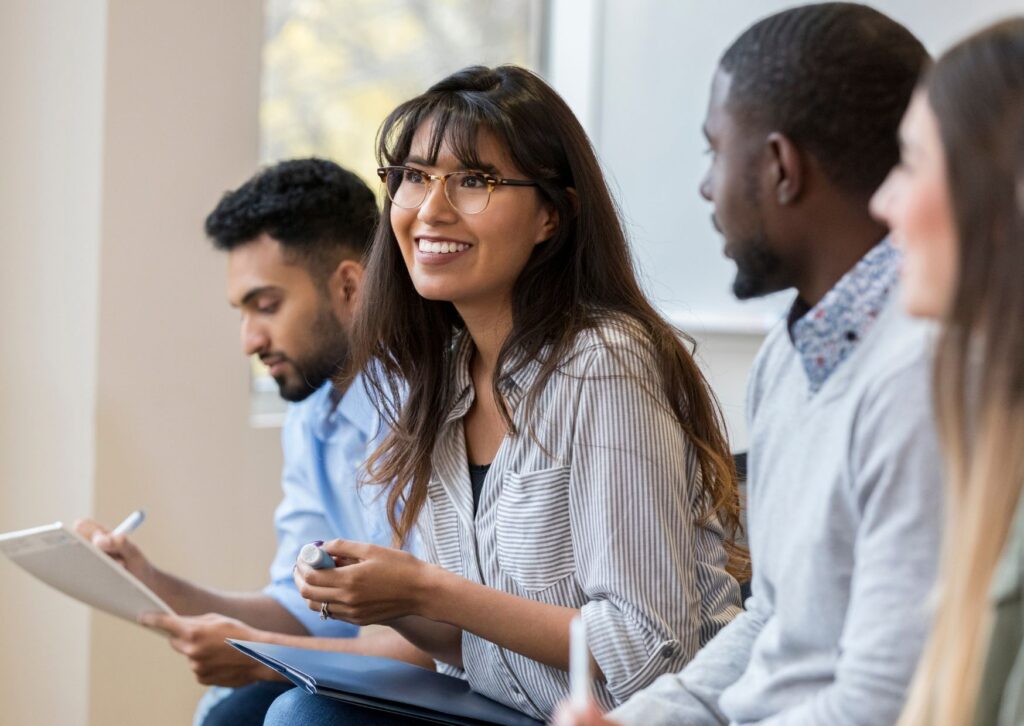 smiling-happy-female-employee-playing-team-games