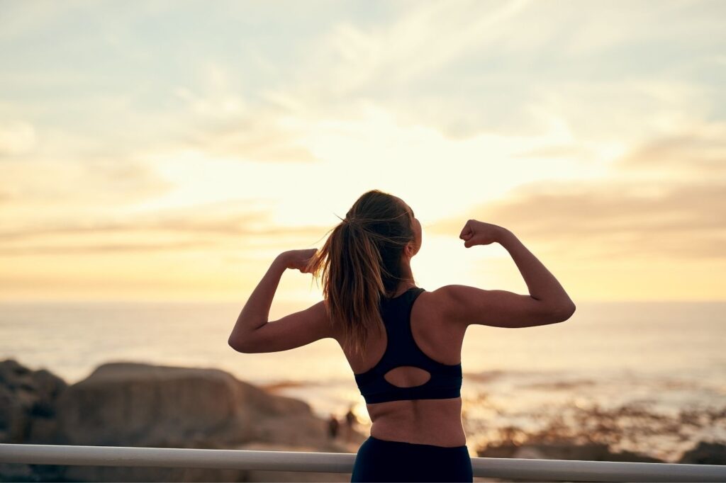 lady-striking-a-confident-pose-flexing-her-biceps