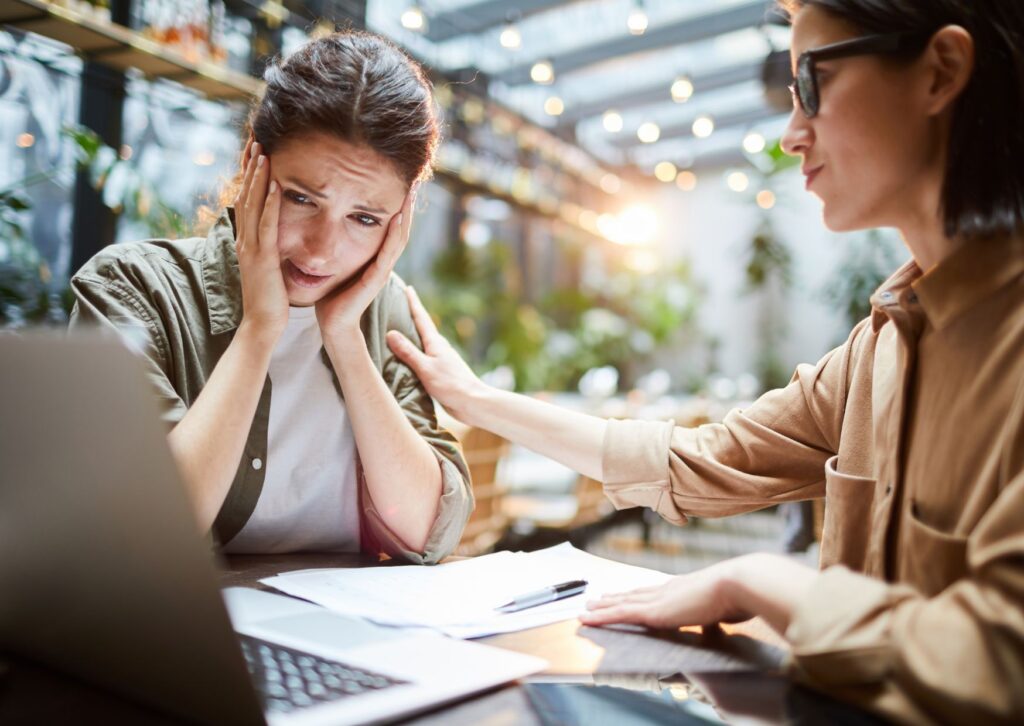 stressed-lady-at-work-being-consoled