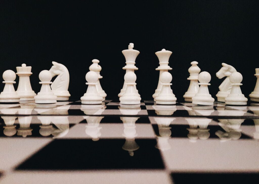 white-chess-pieces-on-a-chess-black-and-white-table