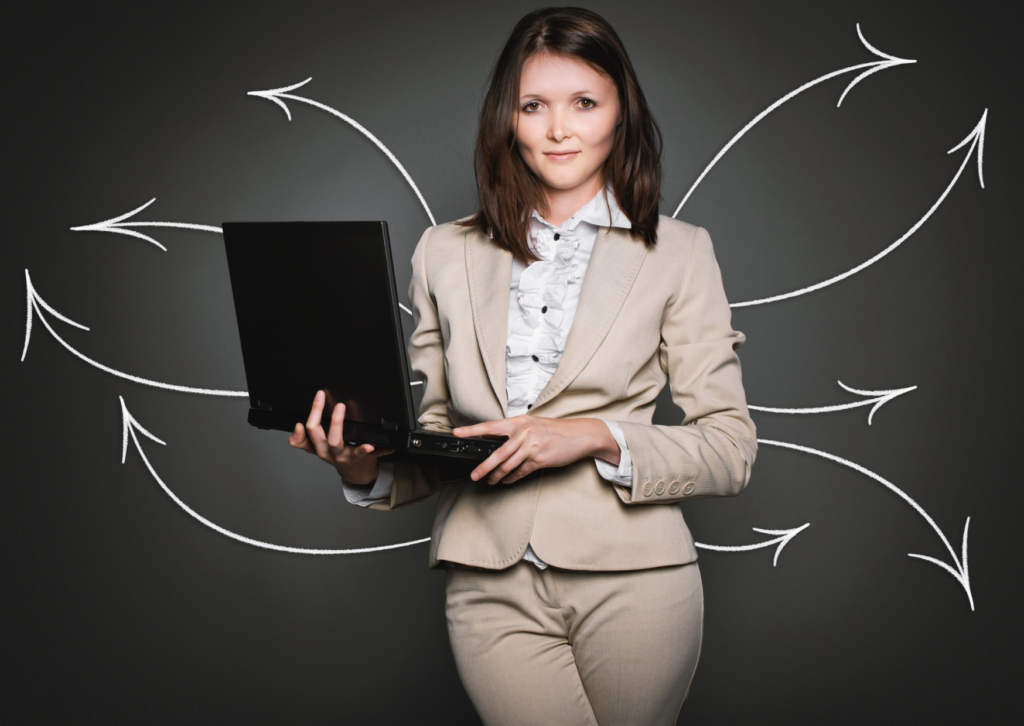 lady-standing-holding-a-work-laptop